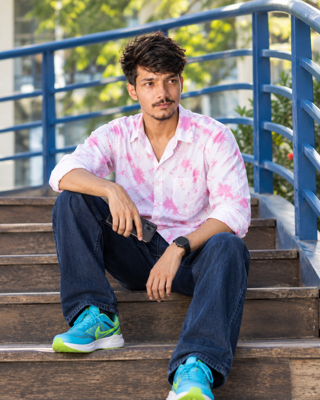 Photorealistic Portrait of Young South Asian Man on Wooden Steps